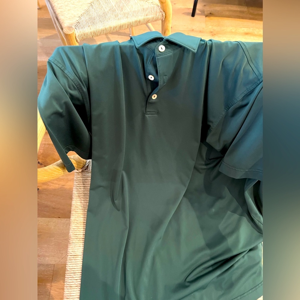 Solid green polo